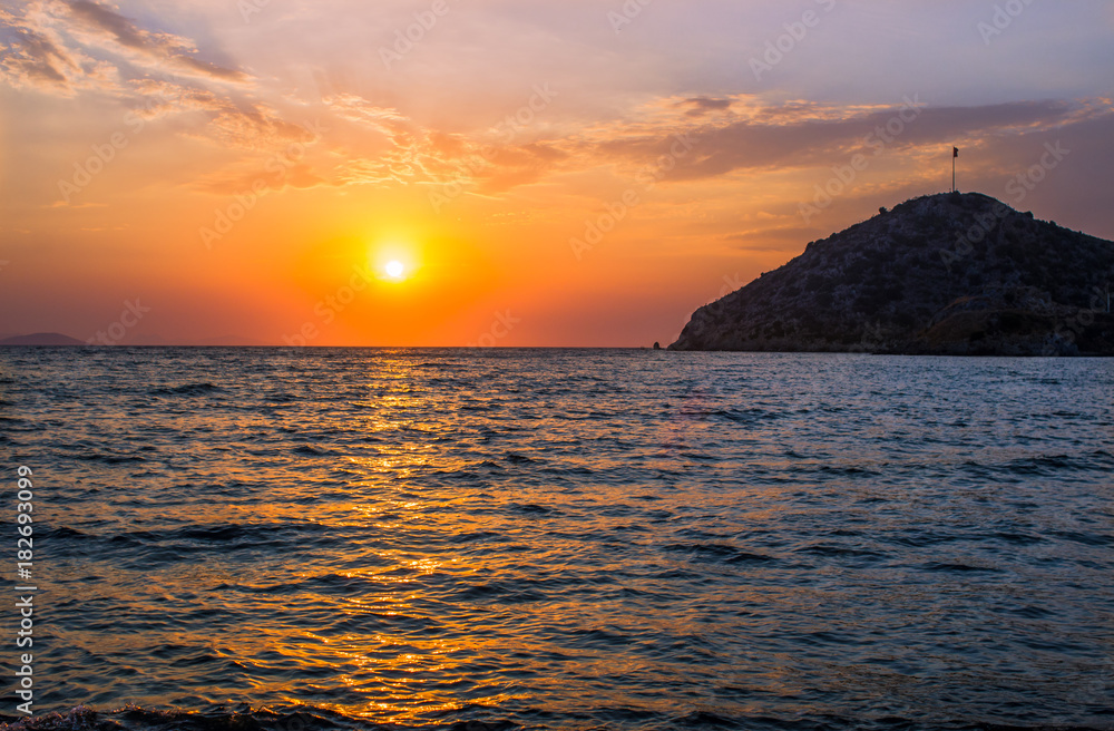 Sunset over the Turkish beach of Gumusluk