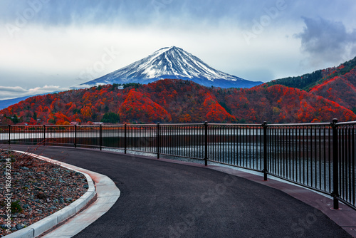  Mt. Fuji and lake in japan with red maple tree. photo