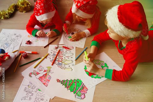 kids making Christmas crafts, family celebration