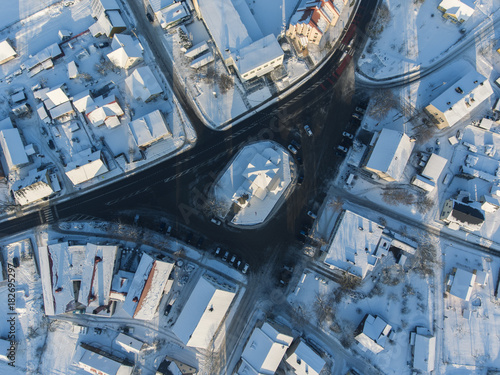 Aerial view over river Nemunas and Merkys connection in small town Merkine, Lithuania. Aerial photography during winter season. photo