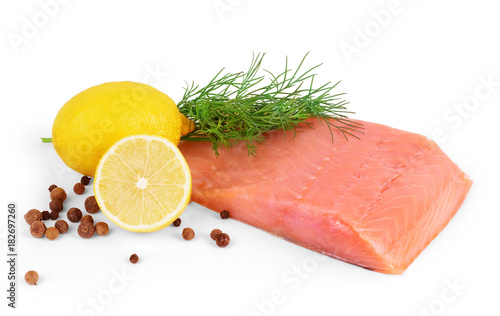 red fish with lemon, pepper and parsley isolated on white background