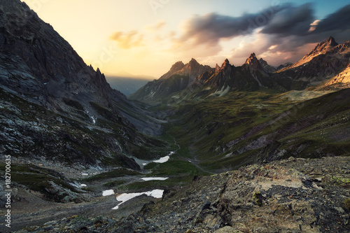 View in the direction towards Collet de la Fourche right before sunset, taken near Col de la Ponsonniere, Valloire, France photo