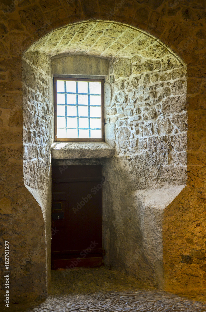 Obraz premium Window frame at the Castle of Gruyere, Switzerland.