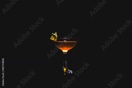 Tequila sunrise cocktail on dark background