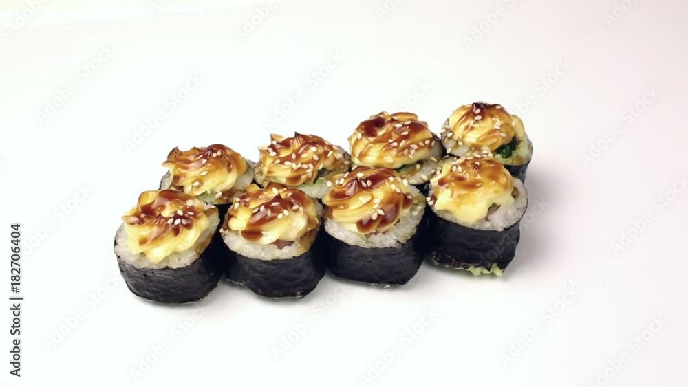 Sushi rolls on a white background. Japanese cuisine sushi rolls of different kinds on a white background isolated Sushi rolls on a white background. Japanese cuisine sushi rolls of different kinds on a white background isolated