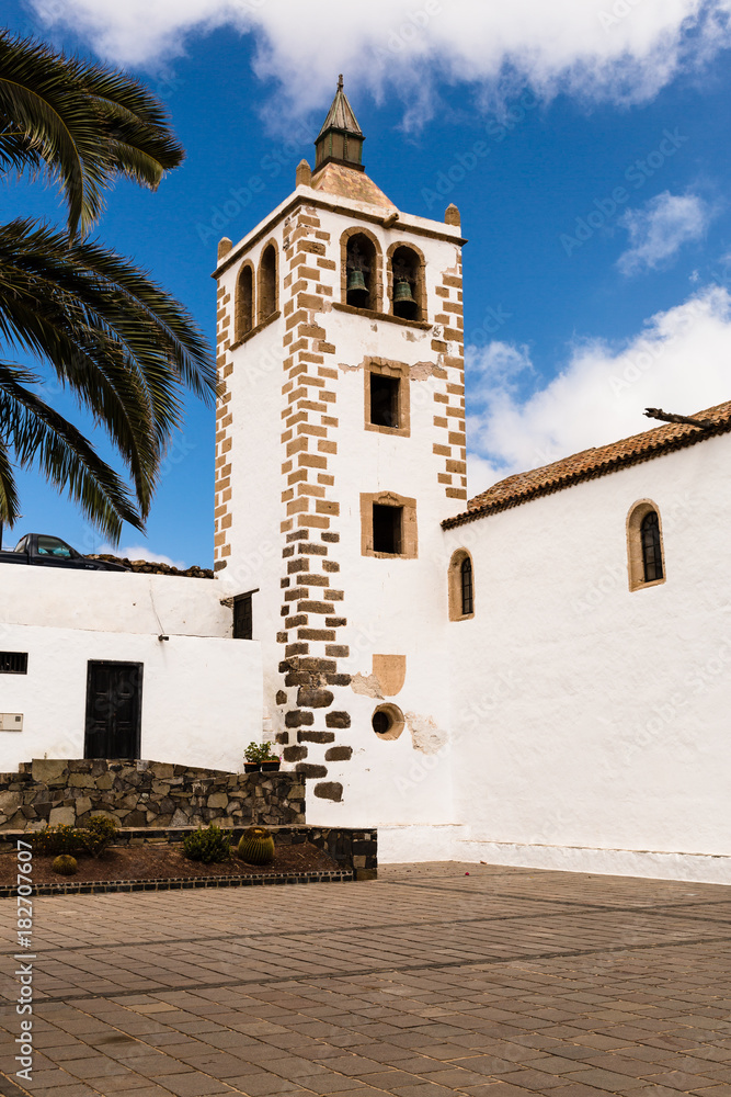 Central square and the bell tower of Saint Mary Church on Fuerteventura, Canary Islands, Spain.