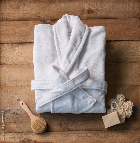 bathrobe bath soap and loofah brush photo