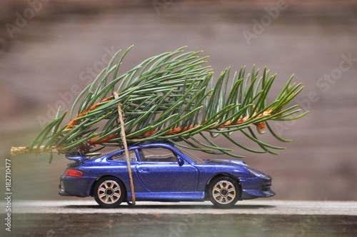 Christmas tree on car toy. Concept of Christmas celebration concept