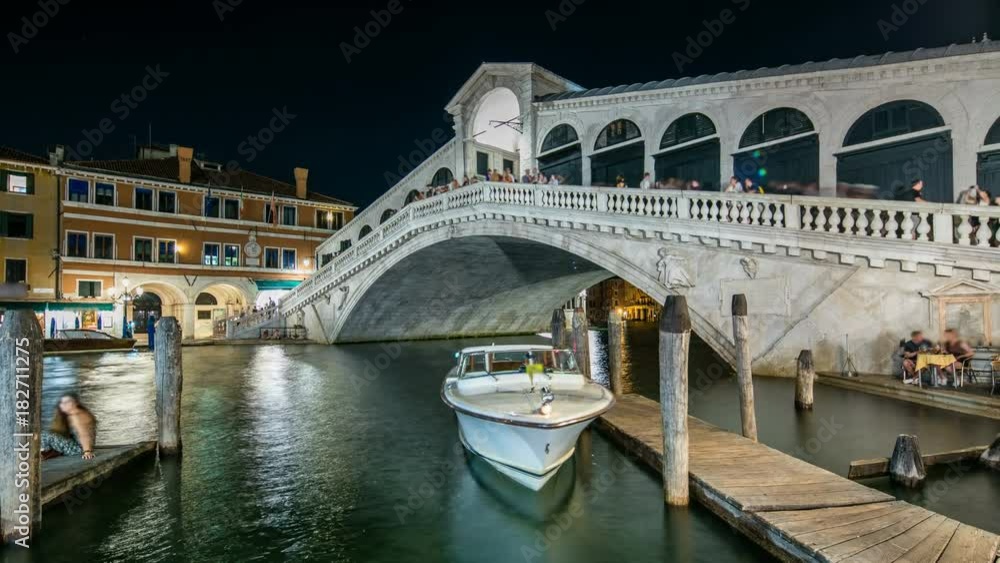 Rialto Bridge or Ponte di Rialto over Grand Canal timelapse at night in Venice, Italy. Rialto Bridge or Ponte di Rialto over Grand Canal timelapse at night in Venice, Italy.