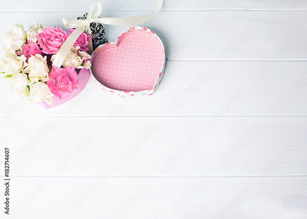 Roses in the heart with sweets. The concept for Valentine's Day Roses in the heart with sweets. The concept for Valentine's Day