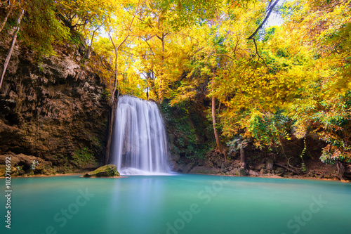 Landscape photo. Waterfall at colorful autumn forest. Erawan waterfall kanchanaburi Thailand
