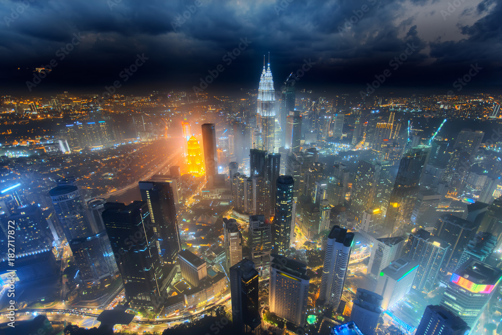 Aerial skyline view to Kuala Lumpur city, Malaysia. Cityscape business skyscrapers night downtown background