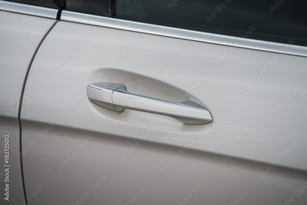 Fototapeta premium Close up on car dor loc and handle