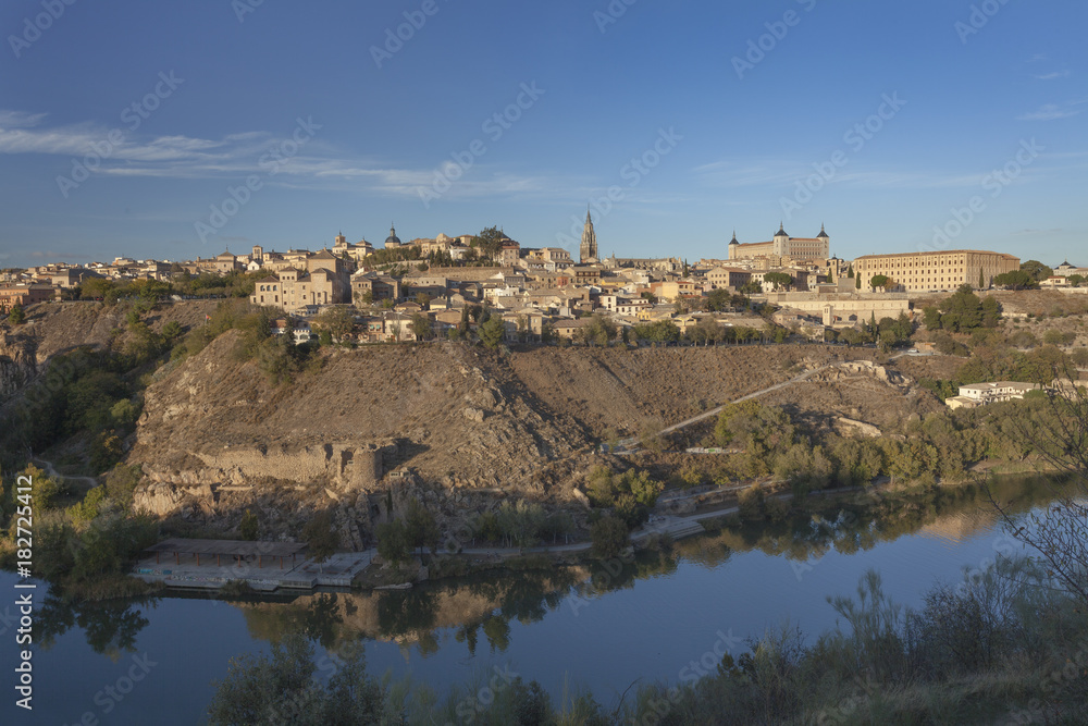 Old town Toledo and its reflection in river Tajo, Spain