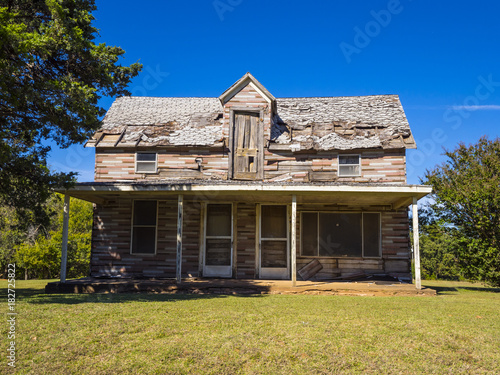 Lost places - old abandoned wooden house at Route 66 photo