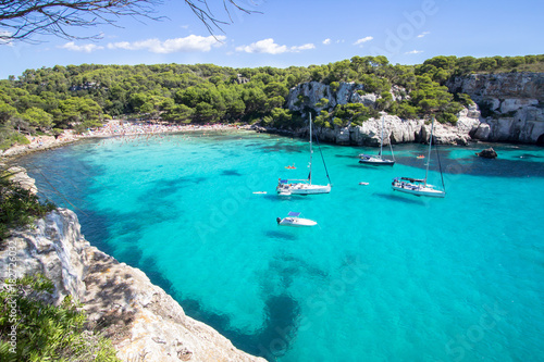 Boats and yachts on Macarella beach, Menorca, Spain