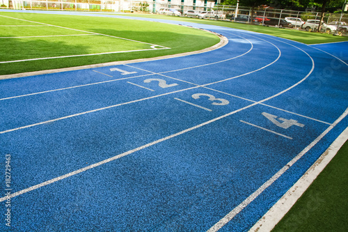 All-weather running track, rubberized artificial running surface for track and field athletics. © Magnetu