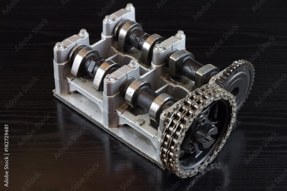 Cross section of the engine with the timing chain isolated on black ...
