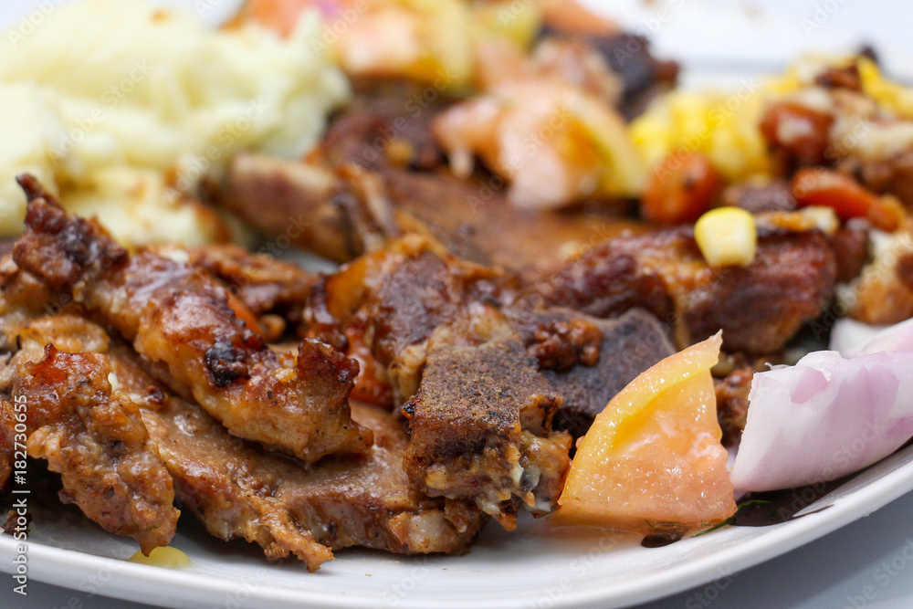 Closeup detail of homemade roast beef meal with vegetables Closeup detail of homemade roast beef meal with vegetables