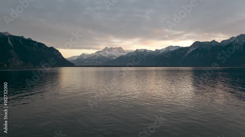 Beautiful aerial view of swiss mountains reflection on lake Geneva