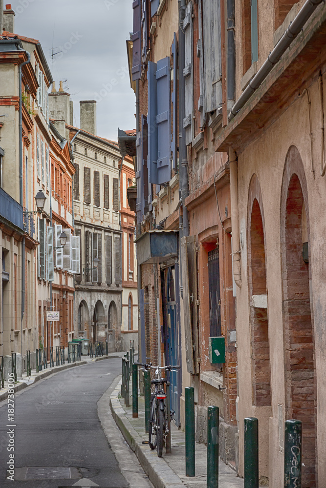 Beautiful narrow street in the city center of Toulouse, France