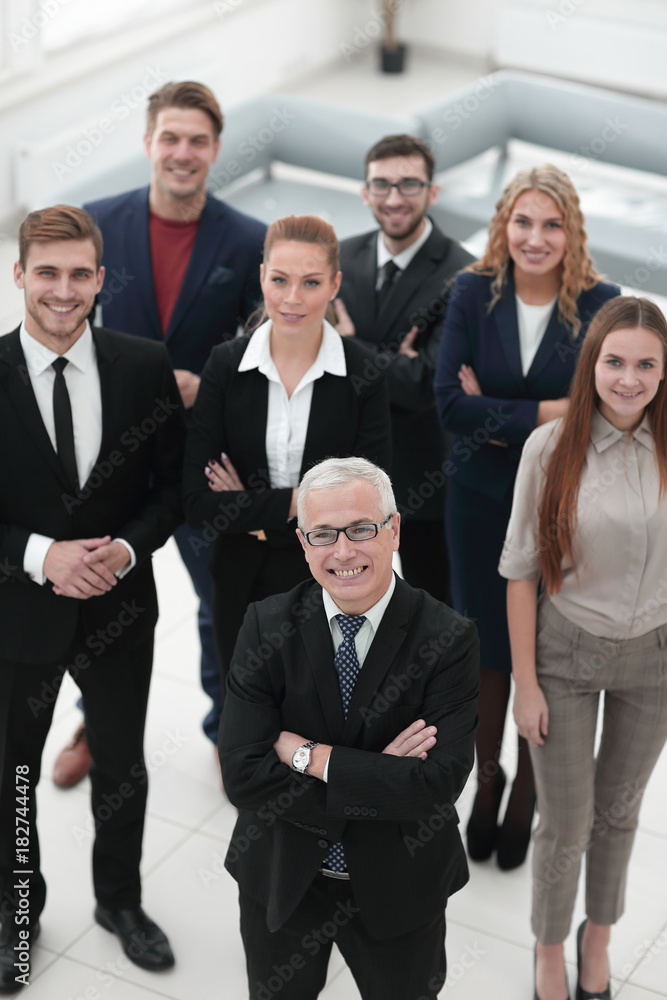 view from the top. group of smiling business people looking at camera. view from the top. group of smiling business people looking at camera.