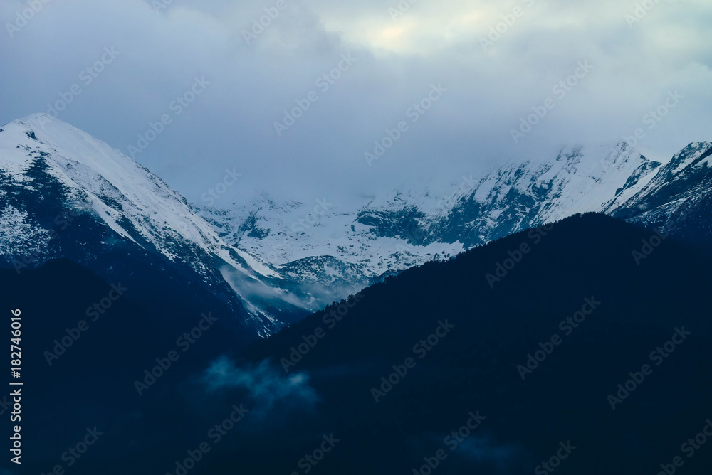 Mountain snow peak, beautiful natural winter backdrop. Ice top of the hill, blue sky background. Alpine landscape. Mountain snow peak, beautiful natural winter backdrop. Ice top of the hill, blue sky background. Alpine landscape.
