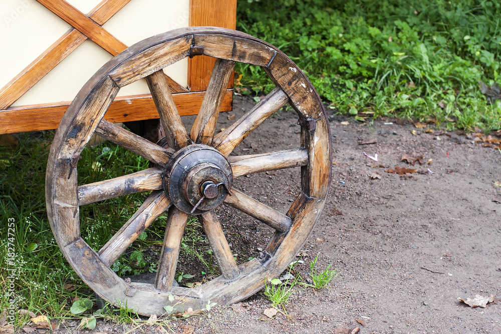 Ancient wooden wheel of cart