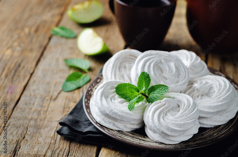 Apple Zephyr on a plate with apples and mint Apple Zephyr on a plate with apples and mint