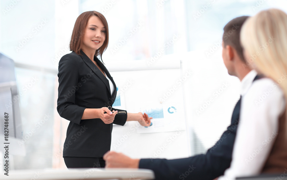 business woman conducts a workshop with the business team. business woman conducts a workshop with the business team.