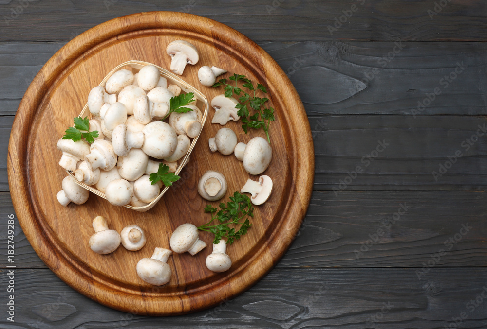 mushrooms on dark wooden background. top view with copy space mushrooms on dark wooden background. top view with copy space