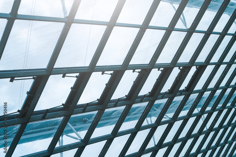 Interior of building hall structure with metal and glass roof