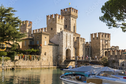 The Castello Scaligero or Scaliger castle, a 13th century medieval port fortification near Lago di Garda in Sirmione, Lombardy, northern Italy