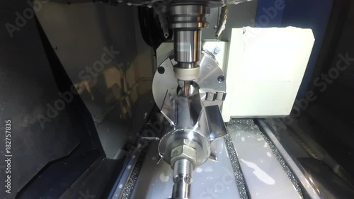 Milling machine from the inside. Industrial production, heavy machinery. Gopro action camera photo