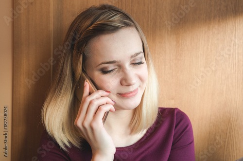 Teenage girl talking on a mobile phone