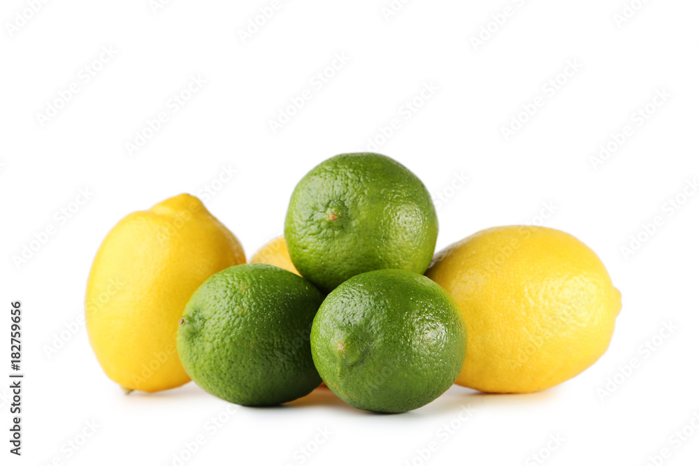 Ripe limes and lemons isolated on white Ripe limes and lemons isolated on white