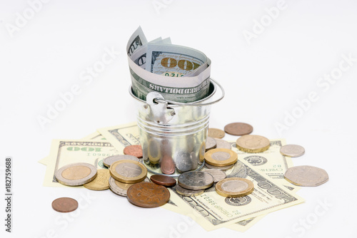 Money in a bucket, banking, storage of capital. photo