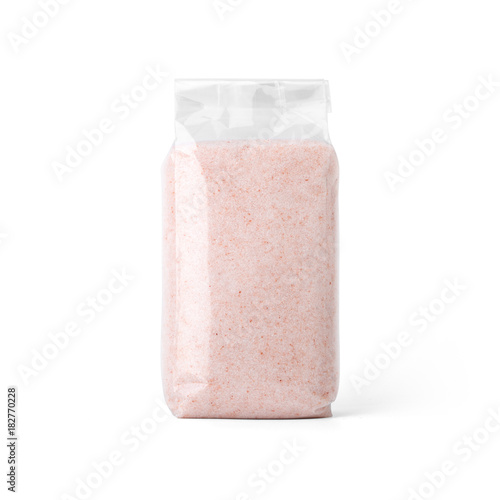 Pink salt in transparent plastic bag isolated on white background. Packaging template mockup collection. With clipping Path included. Stand-up Front view. photo