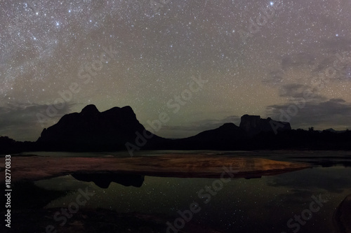 Night shot of Ichu, Uripica and Autana mounts, from Ceguera camp in the Autana river, in Amazonas state, Venezuela photo