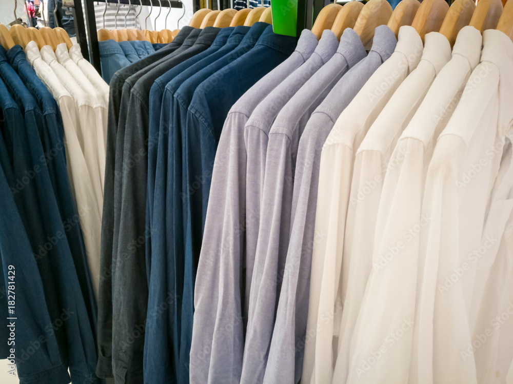 row of white and dark shirt on the shopping mall row of white and dark shirt on the shopping mall