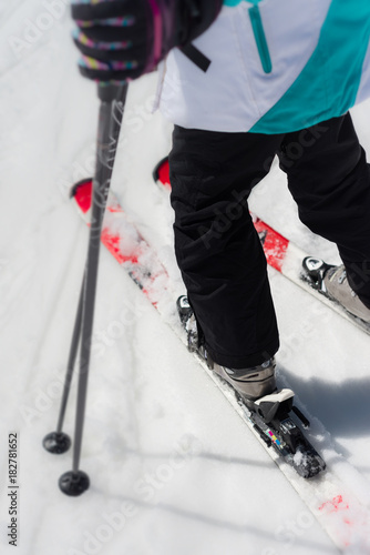 looking down at skis in snow