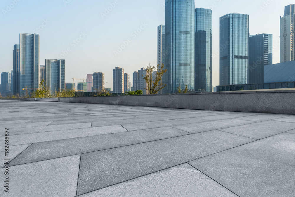 empty brick floor with cityscape and skyline. empty brick floor with cityscape and skyline.
