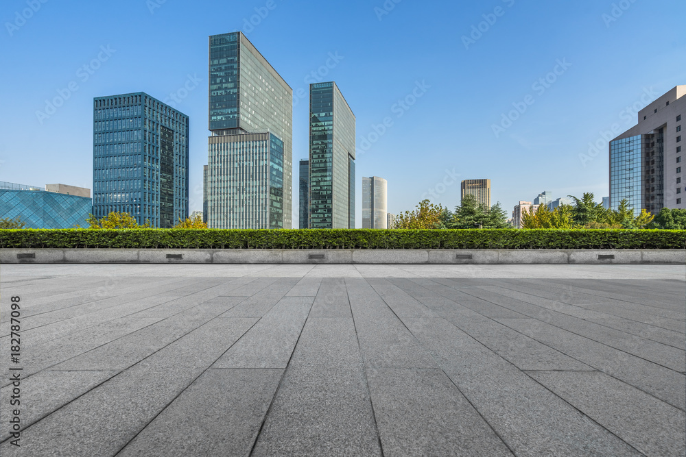 modern buildings and empty pavement in china.. modern buildings and empty pavement in china..
