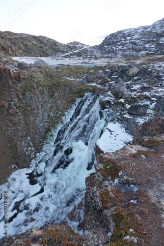 Frozen waterfalls at the Barents Sea coast in Teriberka