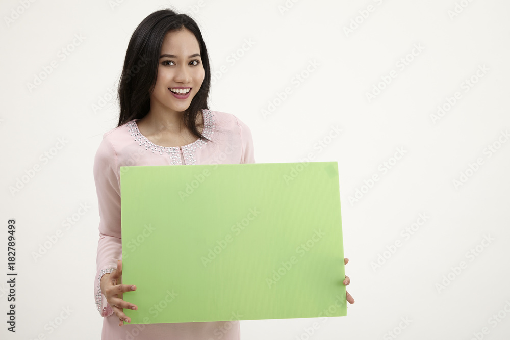 woman holding blank card