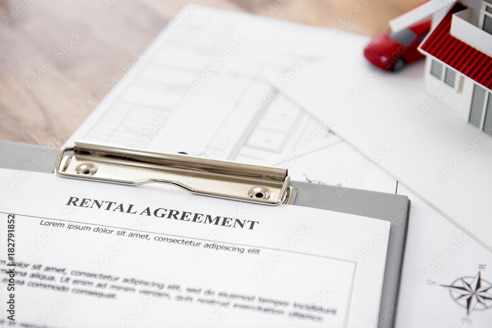 Fototapeta premium Rental agreement contract paper on the table