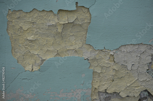 Close up paint layers, many paint and paper layers give an Abstract texture, macro of flake off paint makes background
