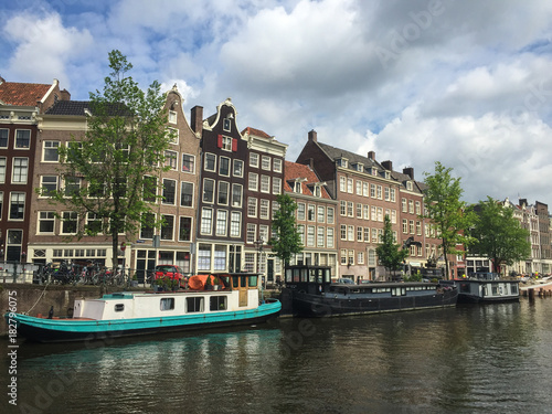View of boats and apartments in an Amsterdam canal