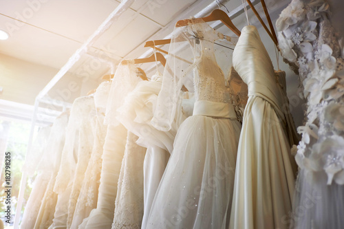 Fotografering Beautiful bridal dress on hangers