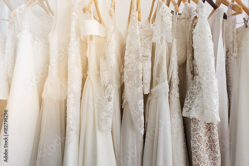 Beautiful bridal dress on hangers